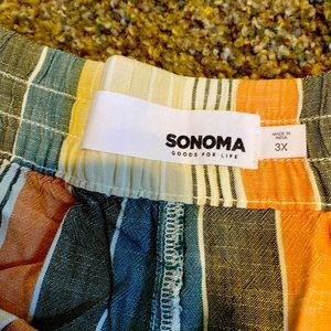 Relaxing shorts with peach and green stripes